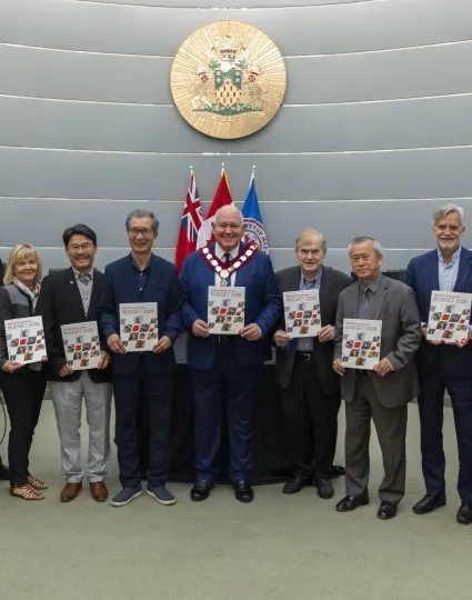 City of Markham's Mayor and councilors holding 2026 budget booklets.