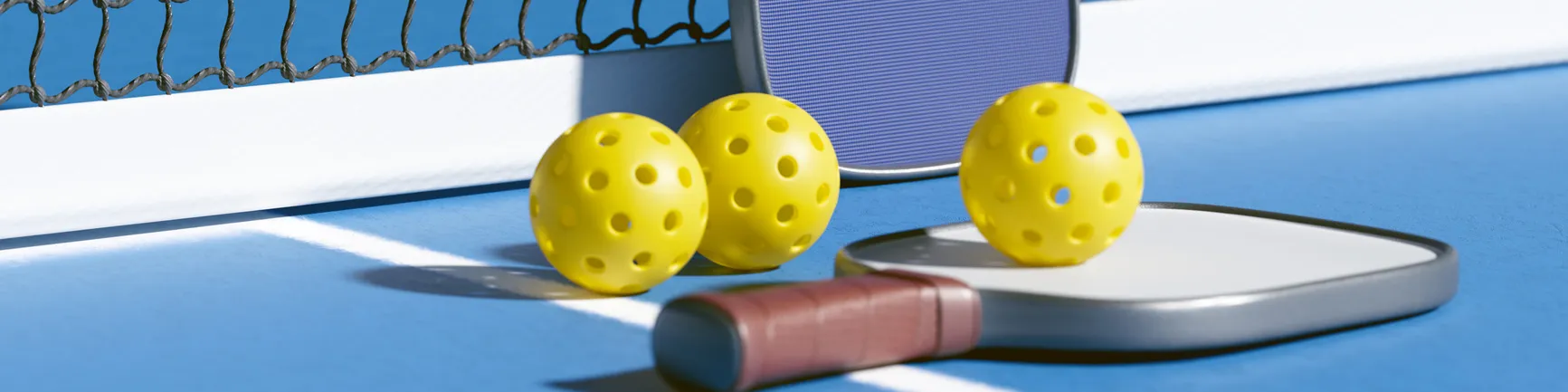 Pickleball Paddle with Yellow Balls